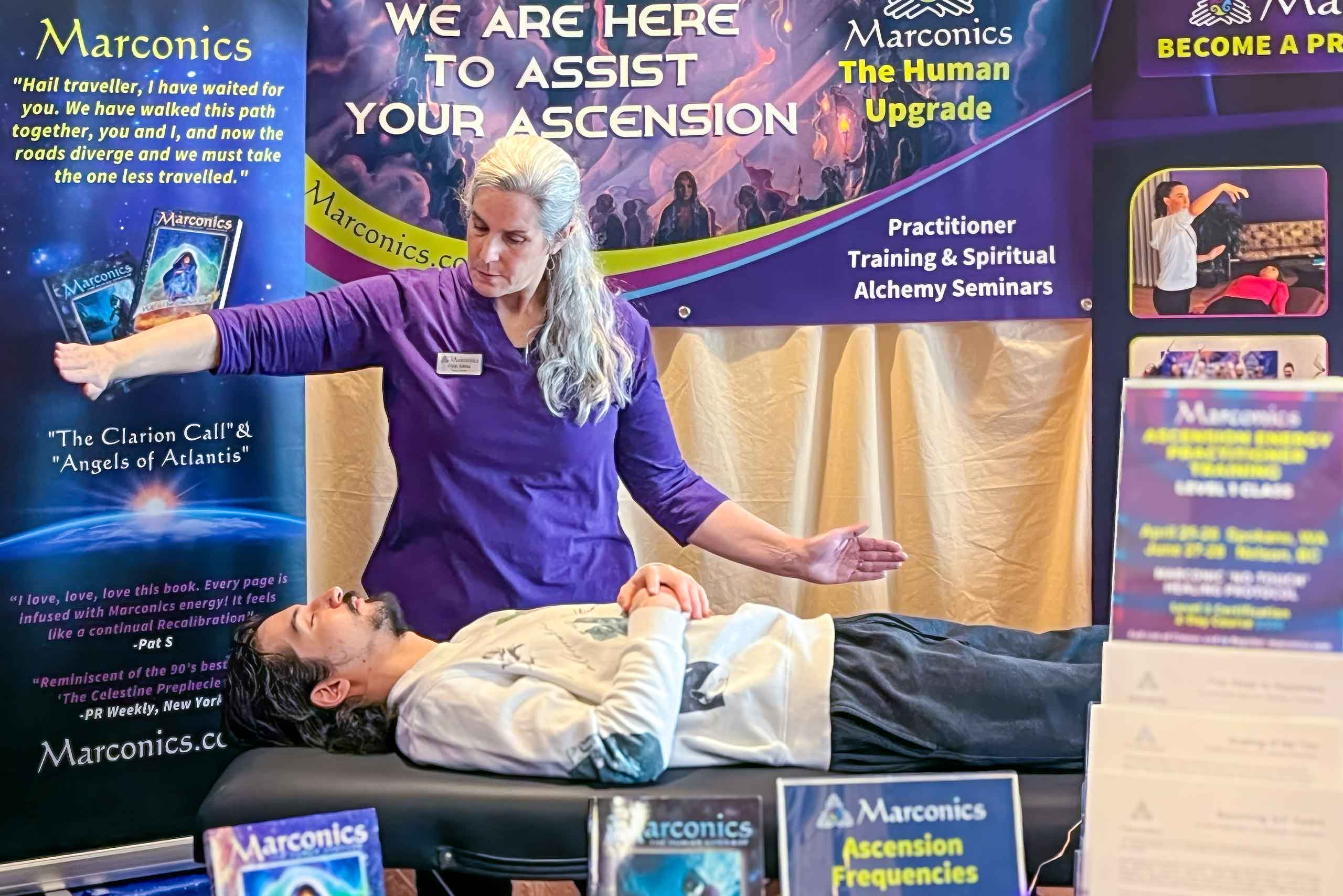 Marconics Teacher Cindy Jordan - performs a sample no-touch at expo Marconics Teacher Cindy Jordan - performs a sample no-touch at expo