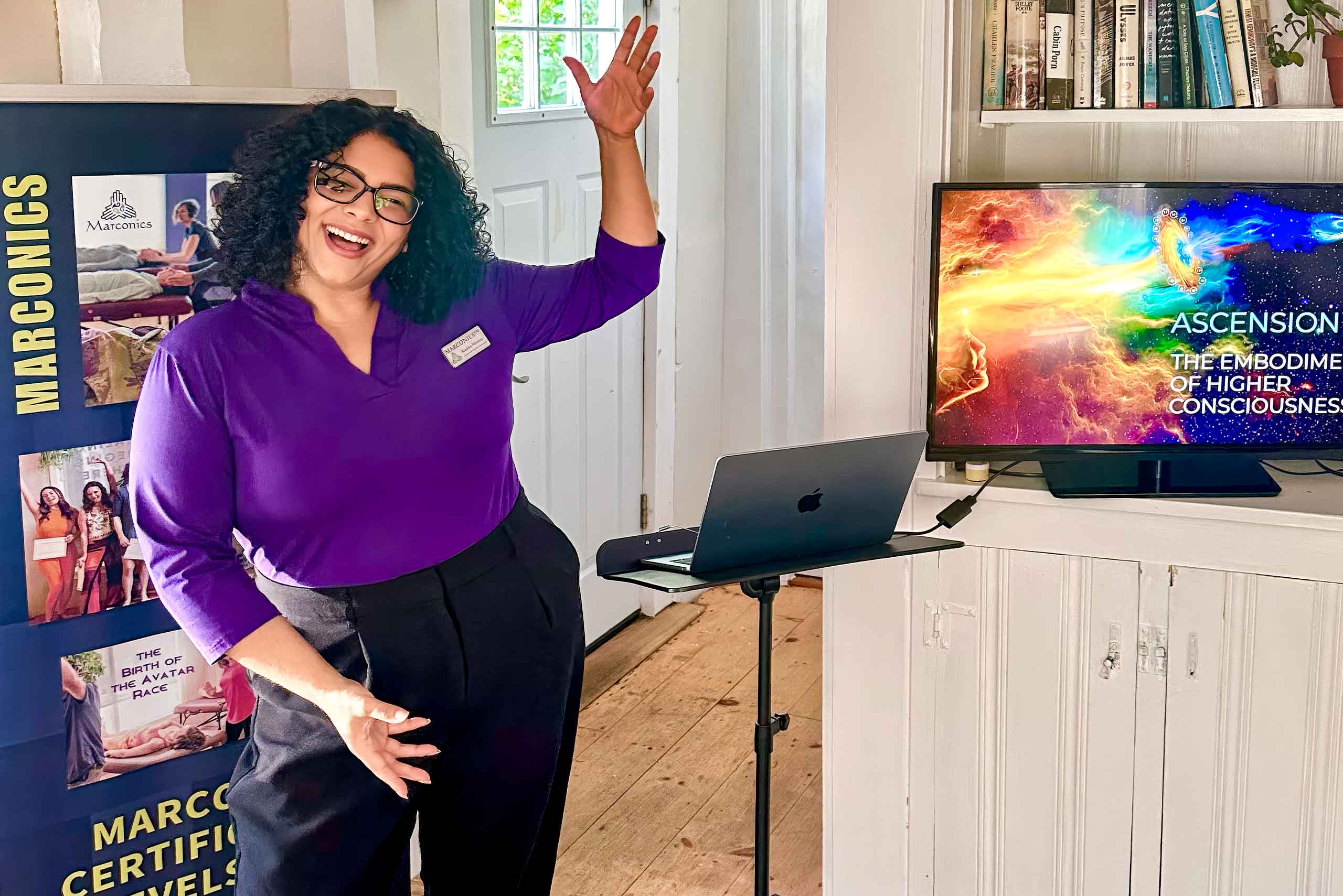 Marconics Teacher Karina Munoz - poses at lecture